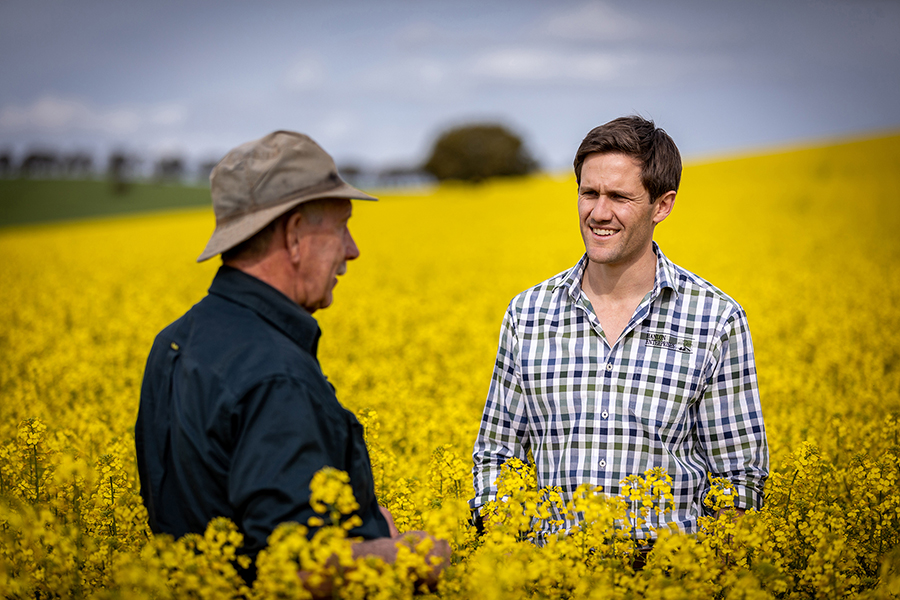 Grain grower Tony Clough (left) with Hanlon Enterprises director Josh Hanlon.