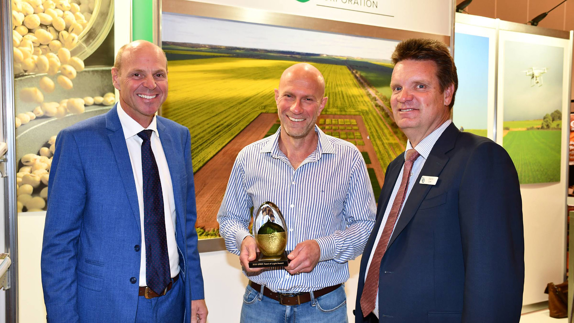 Western Australian adviser Wayne Pluske, centre - an expert in soils, crop nutrition and fertilisers - was presented with the 2020 western region GRDC Seed of Light award by GRDC managing director John Woods, left, and GRDC Western Region Panel chair Darrin Lee.