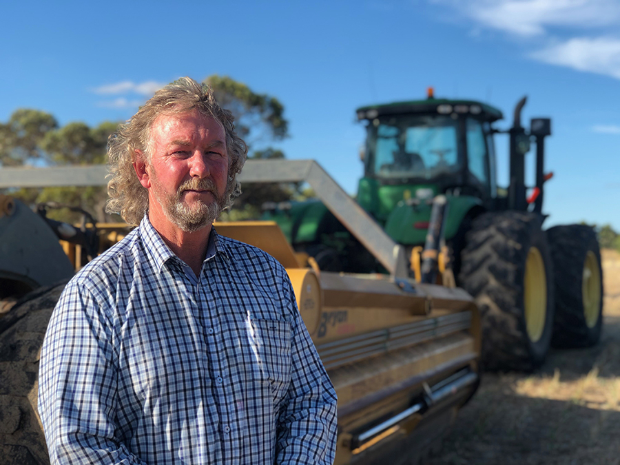 Steve Jaeschke with earthworks machinery on his farm.