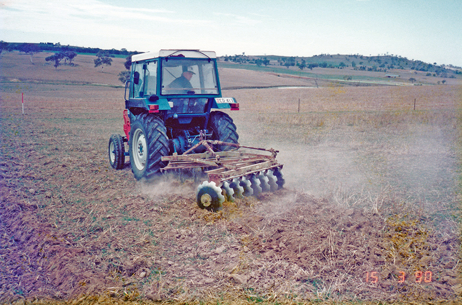 tractor and offset disc plow