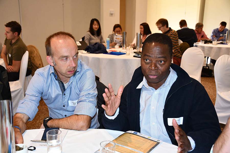 Among grains industry representatives discussing pesticide resistance at the Crop Protection Forum in Moama this week were Roberto Busi (left) from the Australian Herbicide Resistance Initiative and GRDC diseases manager, Friday Obanor. Photo: GRDC