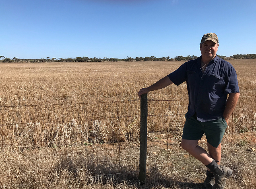 Scott Crettenden with a paddock of ameliorated non-wetting sand on his property at Karkoo, South Australia.