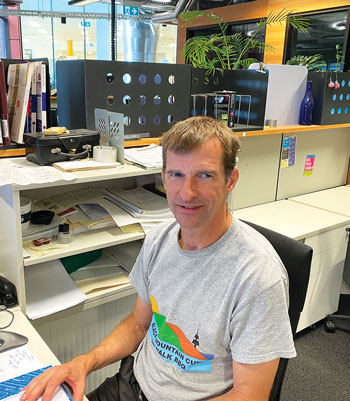 Research scientist working in his office at his computer