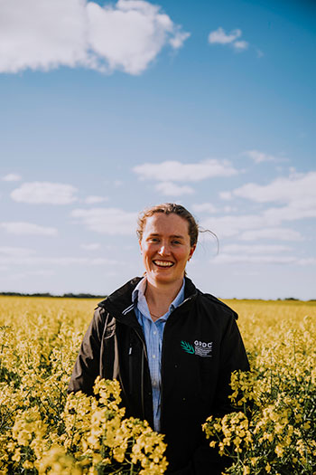 Photo of Rachel Asquith standing in a field