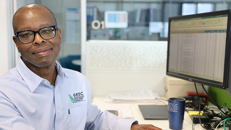 Image of GRDC research data manager Washington Gapare at his desk in GRDC.